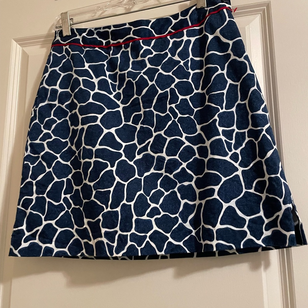 EP golfing skort size 4 in perfect condition.